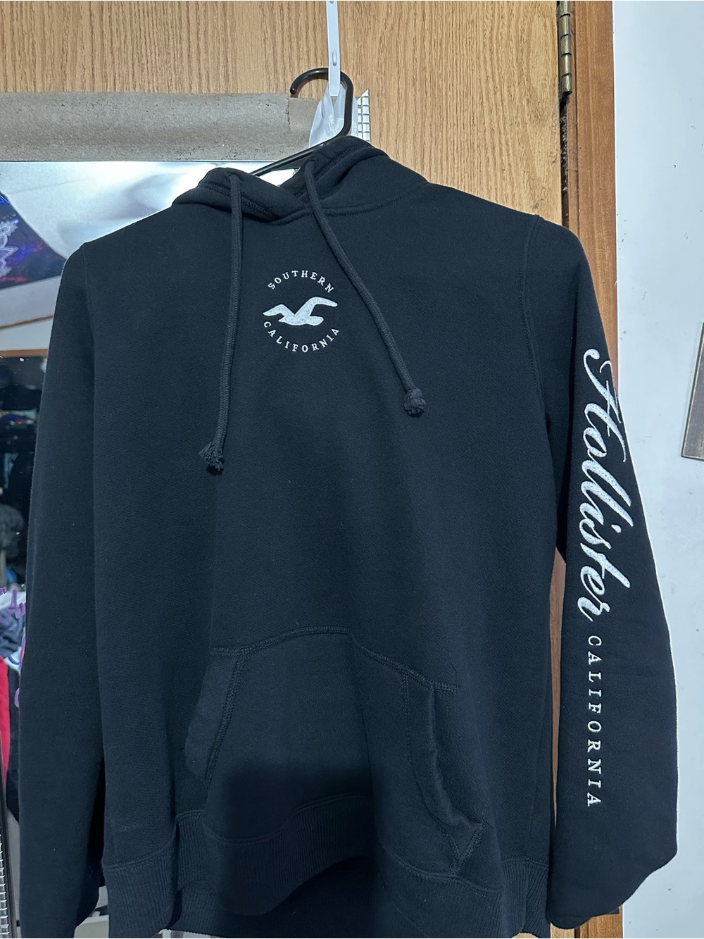 Hollister Black Pullover Hoodie with White Logo Script